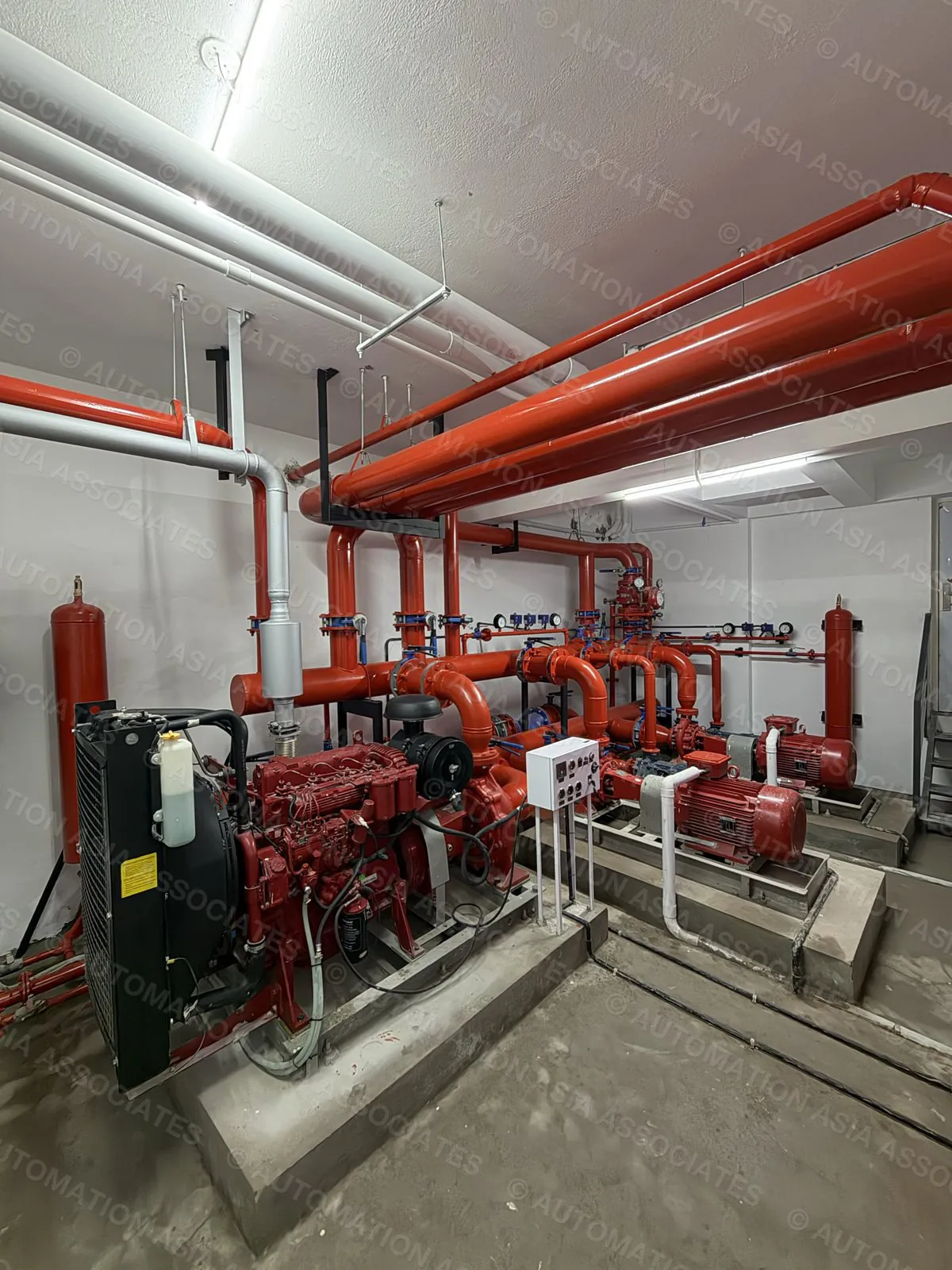 Diesel and electric fire pumps with red header pipework, installed by Automation Asia Associates at Ever, Thiruvananthapuram