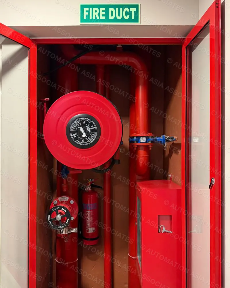 Fire duct with red glazed doors, hose reel, landing valve, extinguisher and hose cabinet